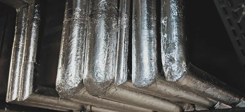 Exposed wrapped pipes