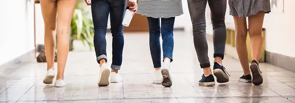 People walking in a hallway