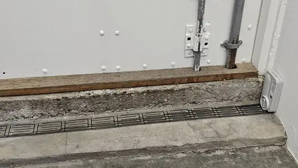 Severn WLD water leak sensor installed on concrete